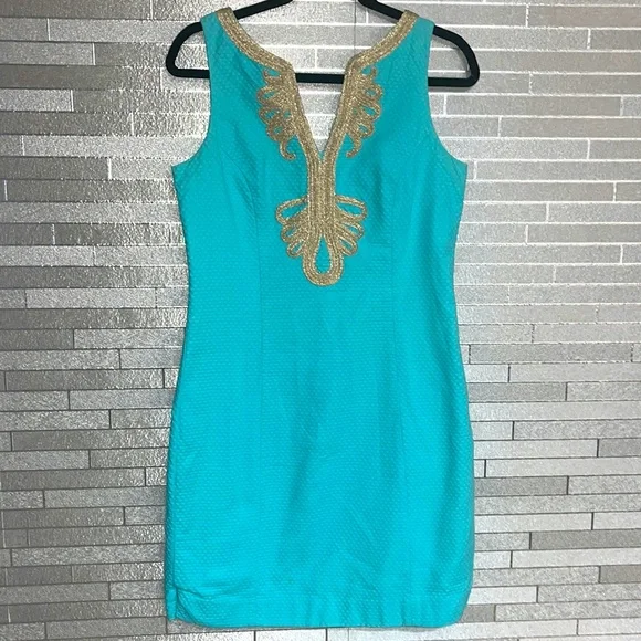 lilly pulitzer turquoise and gold dress It Goes On Black Shift Dress – Shop the Mint main image 1